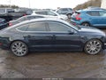 2013 Audi A7 — photo 13 of 16 | VIN WAUYGAFC8DN078957