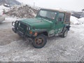 1999 Jeep Wrangler — photo 2 of 11 | VIN 1J4FY19S2XP496573