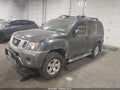 2009 Nissan Xterra — photo 2 of 10 | VIN 5N1AN08W69C500511