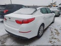 2014 Kia Optima — photo 4 of 11 | VIN 5XXGN4A77EG341033