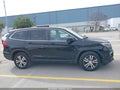 2016 Honda Pilot — photo 12 of 15 | VIN 5FNYF6H56GB123169