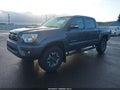 2015 Toyota Tacoma — photo 2 of 18 | VIN 3TMLU4EN9FM203519