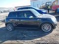 2009 Mini John Cooper Works — photo 13 of 16 | VIN WMWMF93509TF96895