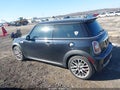 2009 Mini John Cooper Works — photo 14 of 16 | VIN WMWMF93509TF96895