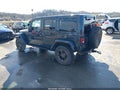 2018 Jeep Wrangler Unlimited — photo 3 of 17 | VIN 1C4BJWDG1JL897376