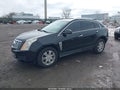 2013 Cadillac SRX — photo 2 of 16 | VIN 3GYFNGE3XDS616658