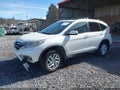 2015 Honda CR-V — photo 2 of 16 | VIN 5J6RM4H7XFL131975