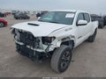 2018 Toyota Tacoma — photo 2 of 17 | VIN 3TMDZ5BN1JM041572