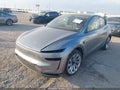 2026 Tesla Model Y — photo 2 of 18 | VIN 7SAYGDEE9TA383212