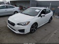 2018 Subaru Impreza — photo 2 of 16 | VIN 4S3GKAM62J3600130