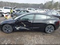 2022 Tesla Model 3 — photo 6 of 19 | VIN 5YJ3E1EA7NF109392