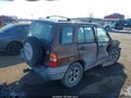 2000 Chevrolet Tracker — photo 4 of 17 | VIN 2CNBJ13C1Y6920638