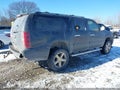 2011 Chevrolet Suburban 1500 — photo 4 of 19 | VIN 1GNSKJE36BR357314