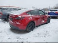 2024 Tesla Model Y — photo 4 of 18 | VIN 7SAYGAEE1RF029632
