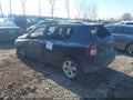 2014 Jeep Compass — photo 3 of 15 | VIN 1C4NJDEBXED910808