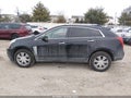 2013 Cadillac SRX — photo 14 of 17 | VIN 3GYFNDE3XDS593493