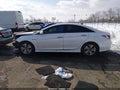 2015 Hyundai Sonata Hybrid — photo 14 of 16 | VIN KMHEC4A41FA131829