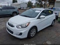 2014 Hyundai Accent — photo 2 of 17 | VIN KMHCT5AE4EU156940