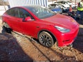 2023 Tesla Model Y — photo 1 of 18 | VIN 7SAYGDEE0PA051603