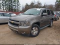 2011 Chevrolet Tahoe — photo 2 of 16 | VIN 1GNSKBE09BR303131