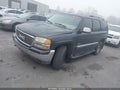 2004 GMC Yukon — photo 2 of 11 | VIN 1GKEC13Z54R219149