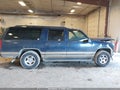 1999 Chevrolet Suburban 1500 — photo 13 of 16 | VIN 1GNFK16R3XJ434456