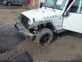 2014 Jeep Wrangler Unlimited — photo 6 of 16 | VIN 1C4BJWDG4EL325904