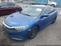 2016 Honda Civic — photo 2 of 19 | VIN 19XFC2F5XGE057484