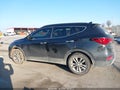 2018 Hyundai Santa Fe — photo 14 of 16 | VIN 5XYZUDLA4JG543645