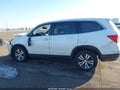 2018 Honda Pilot — photo 14 of 16 | VIN 5FNYF6H59JB036132
