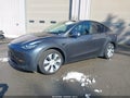 2021 Tesla Model Y — photo 2 of 18 | VIN 5YJYGDEEXMF065679