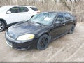 2009 Chevrolet Impala — photo 2 of 11 | VIN 2G1WS57MX91317501