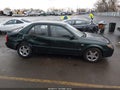 2003 Mazda Protege — photo 12 of 15 | VIN JM1BJ225930215018