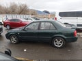 2003 Mazda Protege — photo 13 of 15 | VIN JM1BJ225930215018