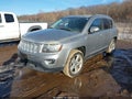 2014 Jeep Compass — photo 2 of 11 | VIN 1C4NJCEA3ED752555