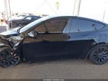 2022 Tesla Model Y — photo 15 of 21 | VIN 7SAYGDEF2NF518111
