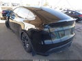 2022 Tesla Model Y — photo 3 of 21 | VIN 7SAYGDEF2NF518111