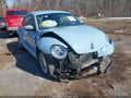2013 Volkswagen Beetle — photo 1 of 17 | VIN 3VWJX7AT9DM682880