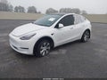 2021 Tesla Model Y — photo 2 of 19 | VIN 5YJYGDED9MF105600