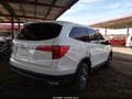 2018 Honda Pilot — photo 4 of 16 | VIN 5FNYF5H53JB002066