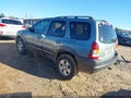 2004 Mazda Tribute — photo 3 of 15 | VIN 4F2CZ96114KM08136