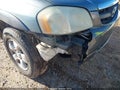 2004 Mazda Tribute — photo 6 of 15 | VIN 4F2CZ96114KM08136