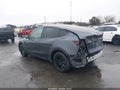 2023 Tesla Model Y — photo 3 of 17 | VIN 7SAYGAEE5PF941919