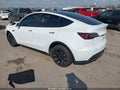 2023 Tesla Model Y — photo 3 of 15 | VIN 7SAYGDEE5PA137442