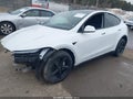 2026 Tesla Model Y — photo 2 of 14 | VIN 7SAYGDED3TA454363