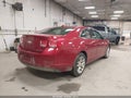 2014 Chevrolet Malibu — photo 4 of 16 | VIN 1G11C5SL1EF168095