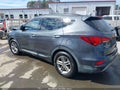2018 Hyundai Santa Fe — photo 14 of 16 | VIN 5XYZU3LB9JG511776
