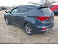 2017 Hyundai Santa Fe — photo 3 of 16 | VIN 5NMZUDLB5HH046967