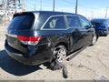2014 Honda Odyssey — photo 4 of 15 | VIN 5FNRL5H67EB076599