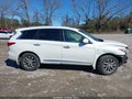 2015 Infiniti QX60 — photo 13 of 16 | VIN 5N1AL0MN1FC520017